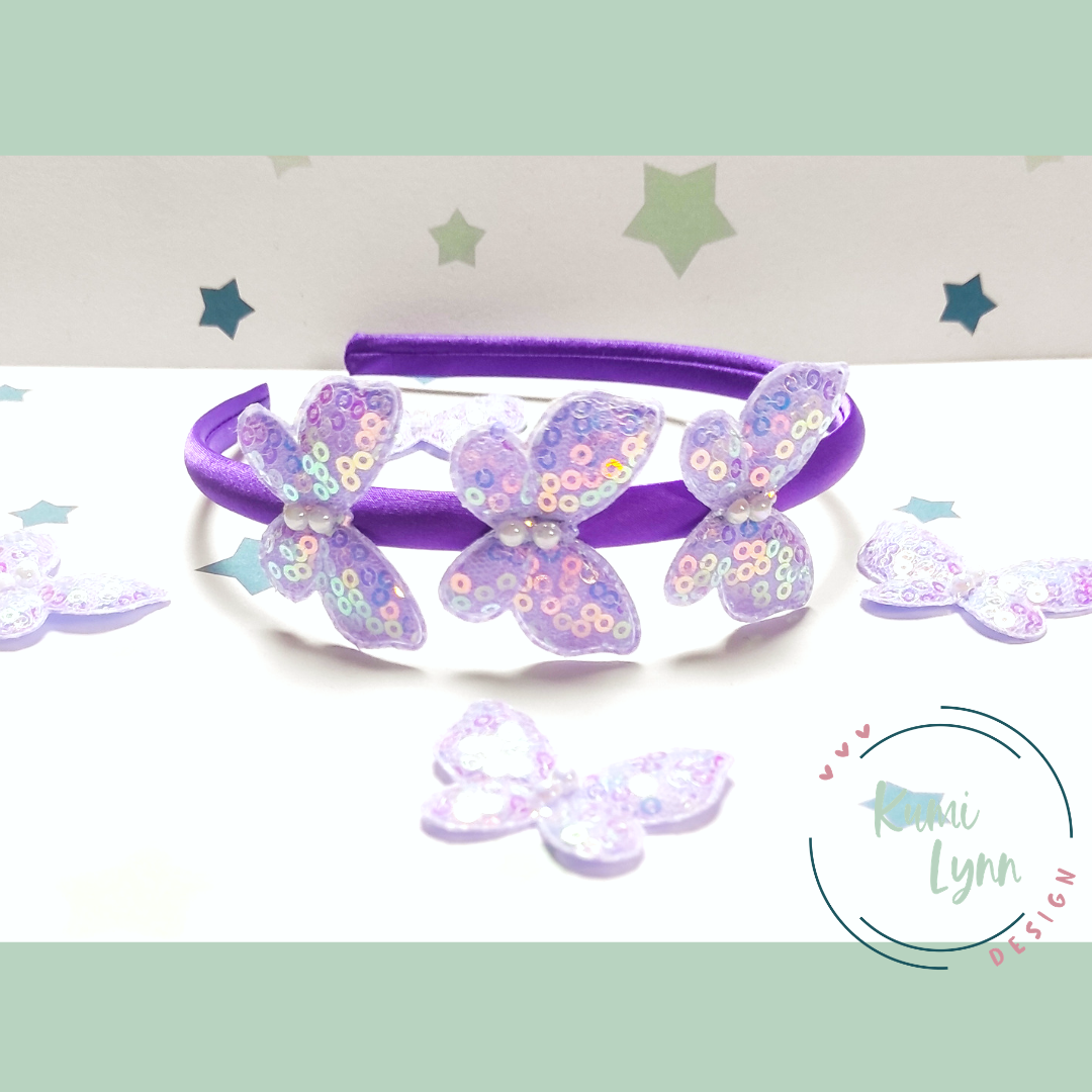 Haarreif mit Schmetterlingen besetzt mit Pailletten -lila-