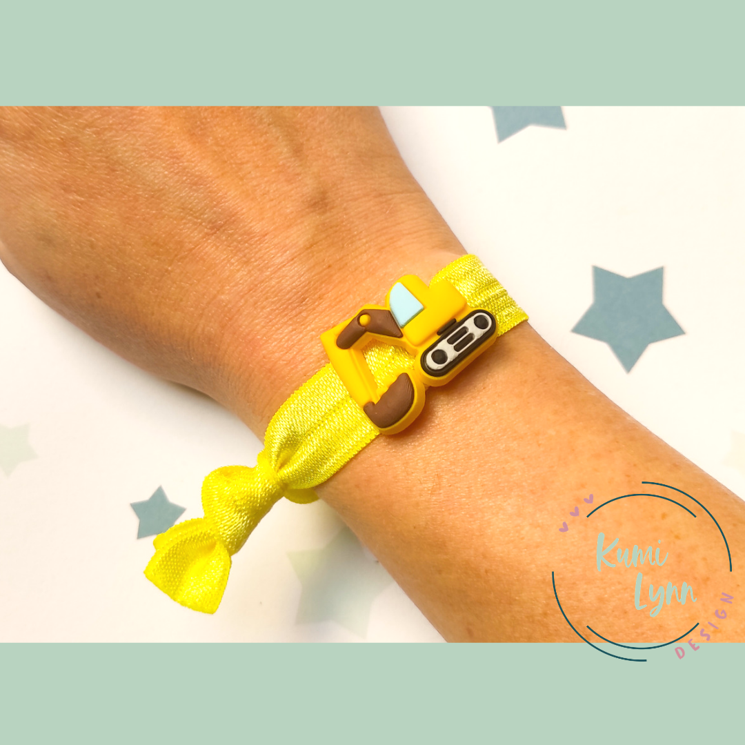 elastisches Armband mit Bagger gelb
